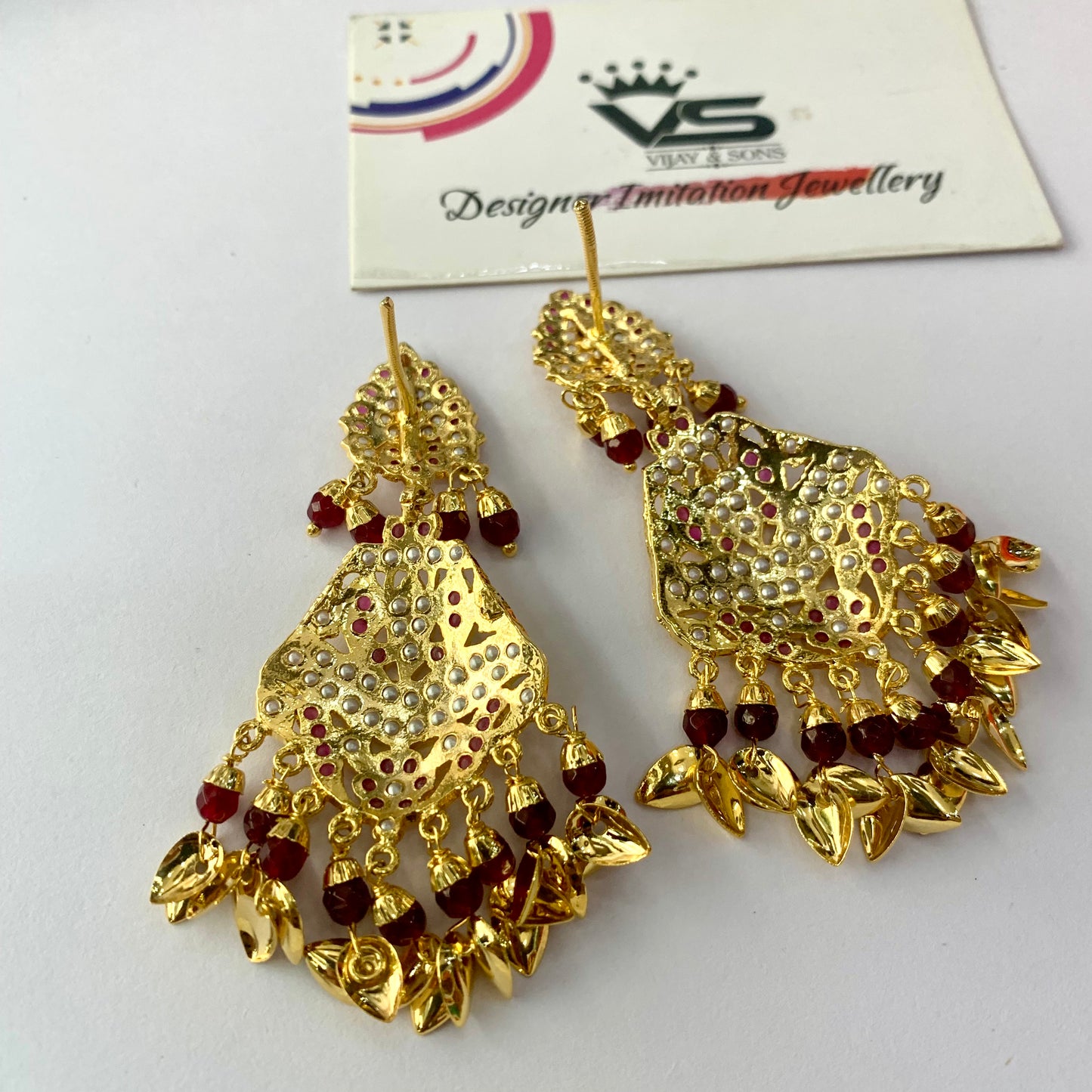 Very pretty design by ruby white Jadau earrings