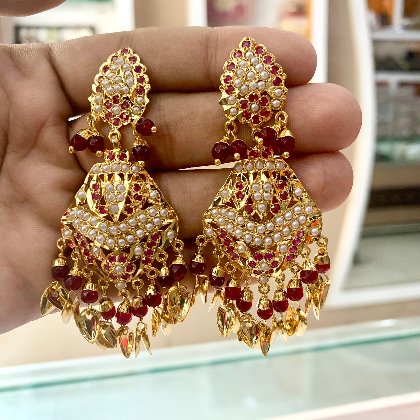 Very pretty design by ruby white Jadau earrings