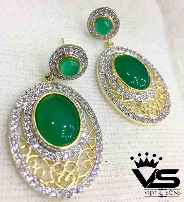 Emerald green stone earrings with cz pointers and pearl drop -